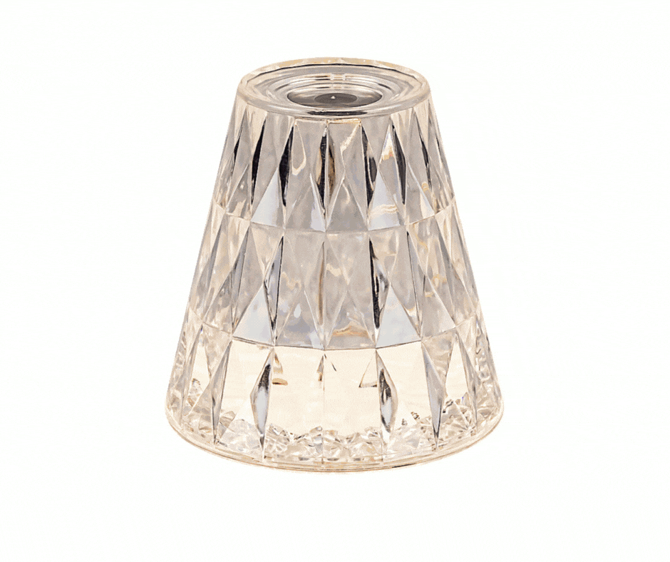 Lampa z przezroczystym kloszem, którą można włączyć za pomocą pilota, a także regulować barwę emitowanego światła.